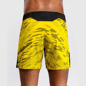 กางเกงขาสั้นต่อสู้ MMA แบบแห้งเร็วสีเหลืองลายพรางสีดำชุดคาราเต้กำหนดเองได้ - Product Image 1