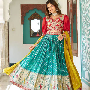 Tela de seda mono pesada azul cielo de diseñador único Lehenga Choli con bordado y trabajo de secuencia para ocasiones festivas - Product Image 1