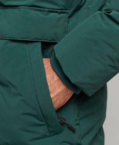 เสื้อแจ็คเก็ตพัฟเฟอร์แบบมีฮู้ดกันน้ำ ระบายอากาศ ป้องกันแบคทีเรีย ไซส์ใหญ่ สไตล์ไฮสตรีท  แบบยูนิเซ็กซ์ สำหรับฤดูหนาว  ผ้าแคนวาส  พร้อมโลโก้ด้านหน้า  สามารถปรับแต่งได้ - Product Image 5