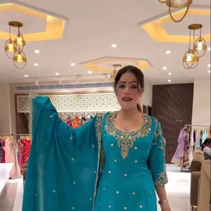 Collection de vêtements ethniques indiens Pure Crepe Silk Heavy Moti Work And Broded Work Party Wear Top and Sharara With Dupatta - Product Image 1