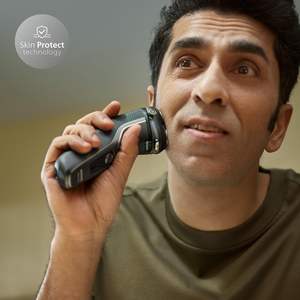 Afeitadora Eléctrica para Hombre con Tecnología de Triple Cuchilla, Uso en Seco y Húmedo, IPX7, Recortadora Extraíble, Base de Carga, Incluye Estuche de Viaje y Repuestos - Product Image 1