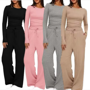 Ensemble deux pièces décontracté pour femmes Couleur unie Pantalon large élastique T-shirt à manches courtes et col en O Broderie tissée à la mode - Product Image 1