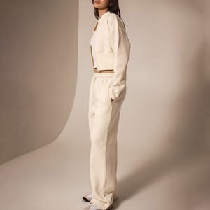 Haute demande beurre crème 2 pièces femmes couture détail et cintré taille survêtement ensemble pleine longueur femmes ensemble 2 pièces survêtement ensemble - Product Image 1