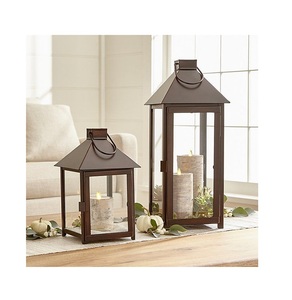 Juego de 2 velas decorativas de metal y vidrio en borde negro acabado para decoración interior y exterior - Product Image 4