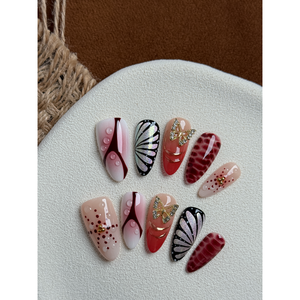 Crimson Wings Press-On Nail Art: Elegante design ad ala per l'arricchimento delle unghie - Product Image 3