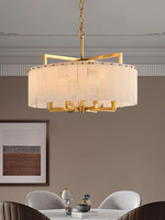Luminaire suspendu moderne de luxe en forme de tambour, en albâtre naturel et laiton doré, pour salons, villas et hôtels.