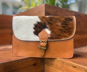 กระเป๋าหนังวัวแท้แบบใหม่ สไตล์ตะวันตก กระเป๋าสะพายข้างผู้หญิง ขายดี กระเป๋าหนังวัวขนแท้ กระเป๋าสะพายไหล่หนังแท้ กระเป๋าถือหนังแท้ - Product Image 2