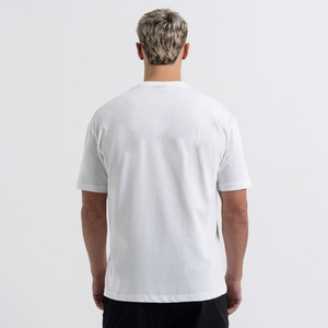 เสื้อยืดโอเวอร์ไซส์ผ้าคอตตอน100% เรียบๆสีขาวเสื้อยืดใส่บนถนนเสื้อยืดพอดีตัว - Product Image 1