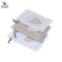Sac de courses en jute blanc avec cordon de serrage, options personnalisables, écologique et durable pour les marchés, les centres commerciaux, les aliments et les outils