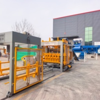 Machine de fabrication de blocs de ciment hydraulique entièrement automatique QT12-15, équipement de production de briques creuses en béton et de pavés autobloquants