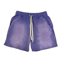 Shorts unisexe personnalisables en toile délavée foncée à bords bruts, de qualité supérieure, pour la vente en gros