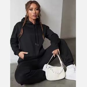 Vente en gros Ensemble sweat à capuche 100% coton OEM pour femmes Combinaison de jogging surdimensionnée à coupe ample et épaisse Combinaison unie et respirante - Product Image 6
