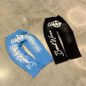 Pantalon de survêtement brodé d'appliques en coton avec logo personnalisé Nouveauté Pantalon de jogging à taille élastique délavé au soleil pour hommes - Product Image 1