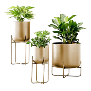 Jardinière d'intérieur design en finition cuivre avec support fin en fer doré, idéale pour les hôtels de luxe, les bureaux, les villas et les intérieurs haut de gamme - Product Image 1