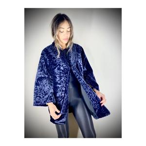 Cappotto da donna in pelliccia sintetica nera foderato