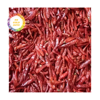 Chili séché rouge du Vietnam de type entier et coupé avec une riche saveur épicée, processus de séchage naturel, approvisionnement en vrac avec emballage personnalisé
