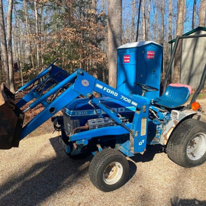 รถแทรกเตอร์ฟอร์ด 1310 มือสอง ขับเคลื่อน 4 ล้อ เครื่องยนต์ดีเซล พร้อมที่ตักและเครื่องตัดหญ้า จัดส่งฟรี - Product Image 1