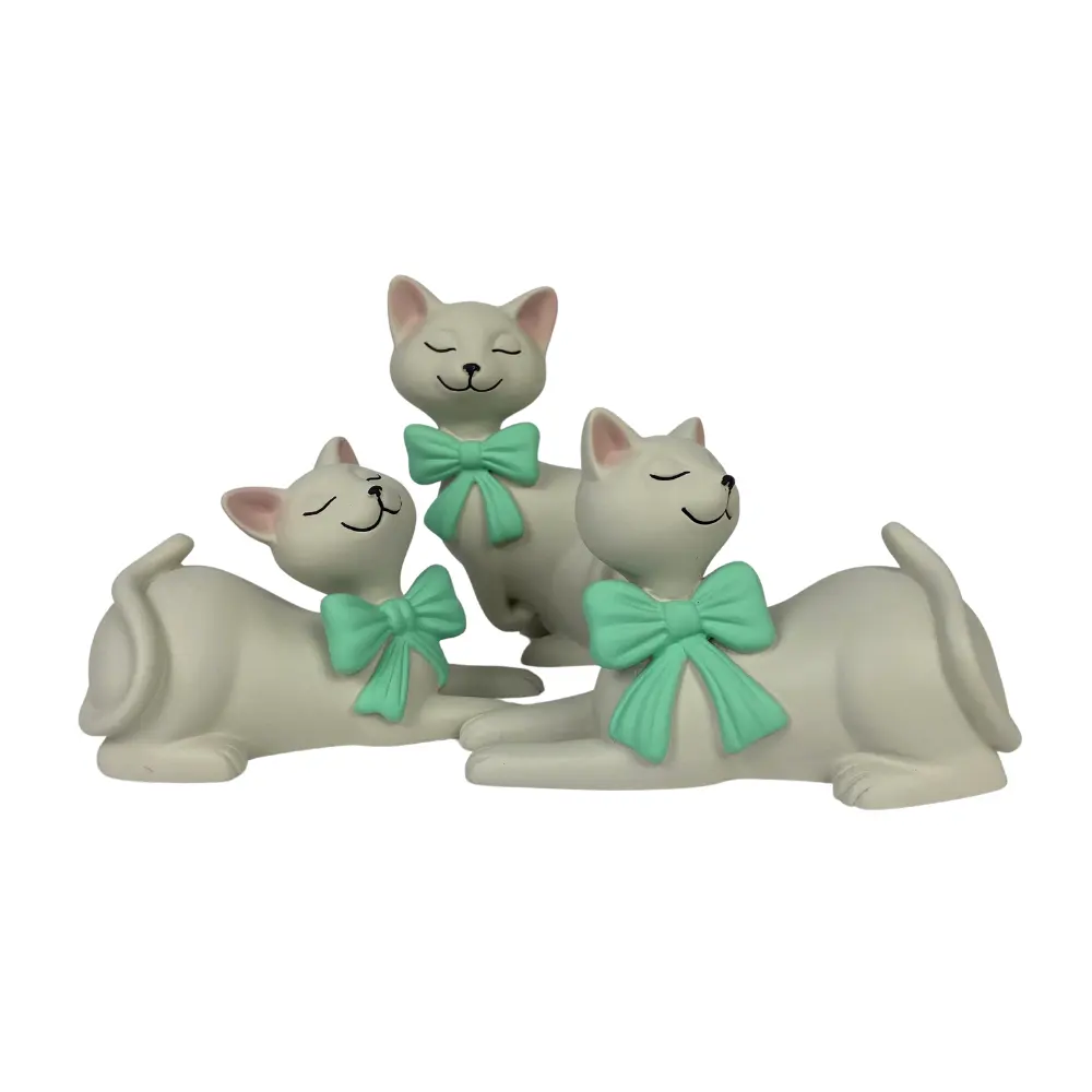 The factory produces cute handmade gray cat figurines to decorate your desk at home as a gift