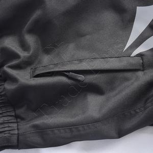 Logo personnalisé Pantalon cargo en polyester léger de couleur unie à taille élastique Pantalon de ski de snowboard imperméable et respirant pour l'hiver - Product Image 4