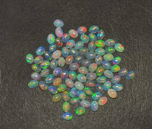 Cabochon ovale multi-feu en opale éthiopienne naturelle certifiée IGI 22 pièces 5*7MM 10 CT Lot de pierres précieuses en vrac pour bijoux - Product Image 2