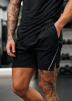 Short d'entraînement sportif 2 en 1 pour hommes OEM Short de sport tissé noir pour hommes avec marque réfléchissante Regular Fit Activewear Commande en gros