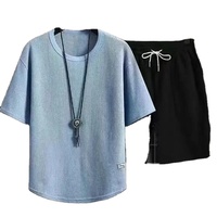 Ensemble short à manches courtes de style sportif décontracté pour hommes tenue respirante confortable pour l'été motif imprimé de couleur pure pour le printemps