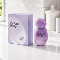Flacon de parfum en verre de 50 ml en gros, forme galet, style estival coloré, contenant de parfum, chaîne d'approvisionnement prête à l'emploi, vente en gros