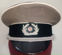 Casquette de ski allemande M43 de la Seconde Guerre mondiale par EREL, motif camouflage SS OAKLEAF, avec décalcomanies pour casque SS OKALEAF et visière générale.