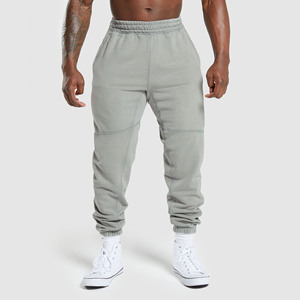 OEM Custom 100% Cotton Terry Pantalons de survêtement tactiques pour hommes Pantalons empilés avec ourlet brut bord coupé lavage à l'acide évasé de haute qualité - Product Image 1