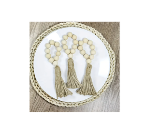 Rond de serviette unique en perles de bois pour fête de mariage Anneaux de serviette Boho Accessoires de table à manger Pendentif à pompon Porte-serviettes - Product Image 1