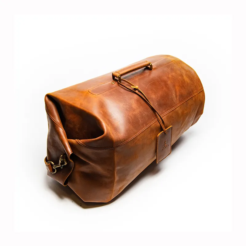حقيبة أمتعة كلاسيكية مُصنعة لعام 2024 حقائب من الجلد الصناعي مصنوعة من الجلد ومزينة بشعار مخصص حسب الطلب للبيع