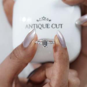 IGI Certified Emerald Cut Engagement <b>Diamond</b> <b>Ring</b> with Side Stones 4 Prong Setting - Product Image 6