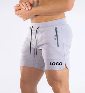 Pantalones cortos de entrenamiento de compresión con logotipo personalizado para hombre Pantalones cortos de gimnasio de malla de patrón sólido con estilo informal de bolsillo - Product Image 1