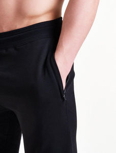 กางเกงวอร์มทรงขาบานผู้ชาย คุณภาพสูง ผ้าฝ้าย 100% สไตล์สตรีทแบบสั่งทำ เอวยางยืด ความยาวปานกลาง-สูง สีเข้ม ล้างแบบดิบ ผลิตตามแบบ OEM - Product Image 5