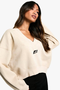 Sudadera de forro polar para mujer con cuello en V, manga larga, estilo relajado, casual, color liso, con logo minimalista en el pecho, estilo urbano, al por mayor - Product Image 3
