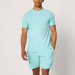 Conjunto informal de punto de manga corta y pantalones cortos de color sólido para hombre, ropa de playa ligera, cintura elástica, relajación de verano de talla grande - Product Image 4