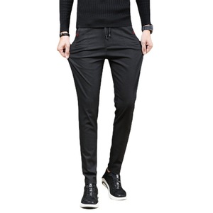 Pantalon slim extensible pour hommes, taille moyenne, couleur unie, pantalon droit décontracté en lin, logo personnalisé OEM avec broderie de motifs imprimés - Product Image 1