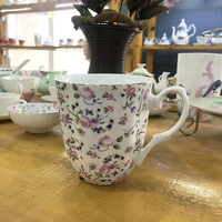 Vente en gros de tasse en céramique de nouveau style de haute qualité en porcelaine de conception de fleur tasse à café tasse à thé