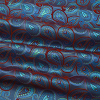 Yili Dynamique et Tendance Vague Tricolore Fleur De Cajou Motif Paisley Avec Fond Bleu Profond, Tissu De Vêtements Vibrant