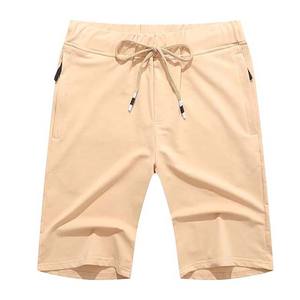 Pantalones cortos de gimnasio para hombre personalizados producidos en fábrica con su propio logotipo cómodos e ideales para ropa deportiva - Product Image 1