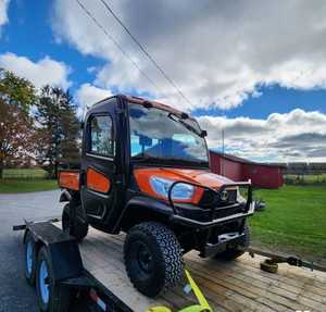รถ Kubota RTV-X1140 ราคาดีที่สุดสำหรับขาย รถที่ทนทานและอเนกประสงค์สำหรับใช้งานในสถานที่ทำงานและฟาร์ม มีตัวเลือกขายส่ง - Product Image 1