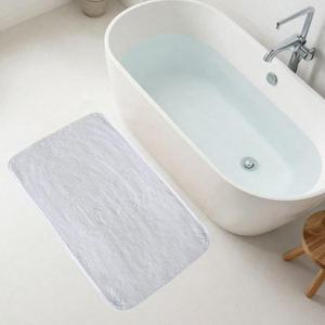 Tapis de bain de luxe ovale uni en jacquard tissé teint en fil, coton/polyester recyclé, 70x120cm, collection hôtelière, haute absorption - Product Image 1
