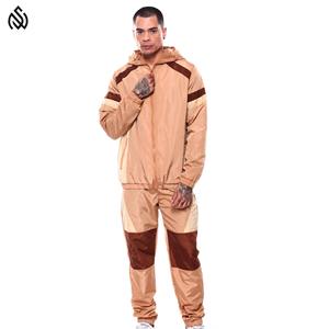 ชุดวอร์มสองชิ้นสำหรับผู้ชายชุดกันลมลำลองสำหรับผู้ชายชุดวอร์มเสื้อกันลมผ้าโพลีเอสเตอร์สำหรับผู้ชายโลโก้ตามสั่งทันสมัย2025 - Product Image 1