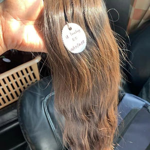 Brun brut ondulé brut indien Temple cheveux humains du sud de l'inde vierge remy prix de gros bon marché - Product Image 1