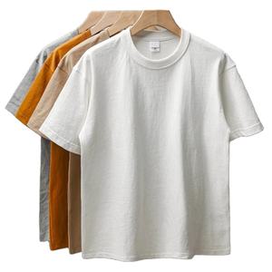T-shirt épais unisexe à manches courtes, col rond, en pur coton, couleur unie, style luxe léger, pour l'été - Product Image 1