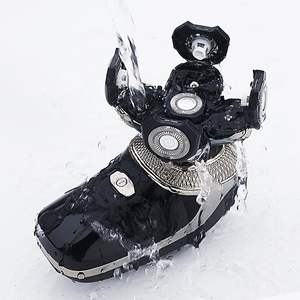 Kit de Afeitado Eléctrico Recargable por USB para Hombre, Afeitadora Rotativa para Cabeza Húmeda/Seca, Triple Cuchilla, IPX7, Lavable, Repuesto para Cuerpo - Product Image 1