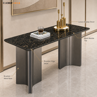 Table console rectangulaire moderne de luxe avec plateau en marbre noir rotatif, base en métal brossé, 8 places, pour entrée d'hôtel, salle à manger