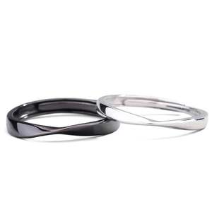 แหวนคู่เงินแท้ Jeulia Mobius ชุบโรเดียม ประดับทอง 14K ของขวัญสำหรับคู่รัก - Product Image 1