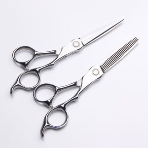 Meilleur ensemble de ciseaux de barbier sur mesure avec poignée en céramique et pointe de lame tranchante pour couper les cheveux de qualité supérieure - Product Image 1