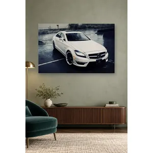 Impression sur toile de Mercedes CLS blanche Fida dans un parking pluvieux - Product Image 1
